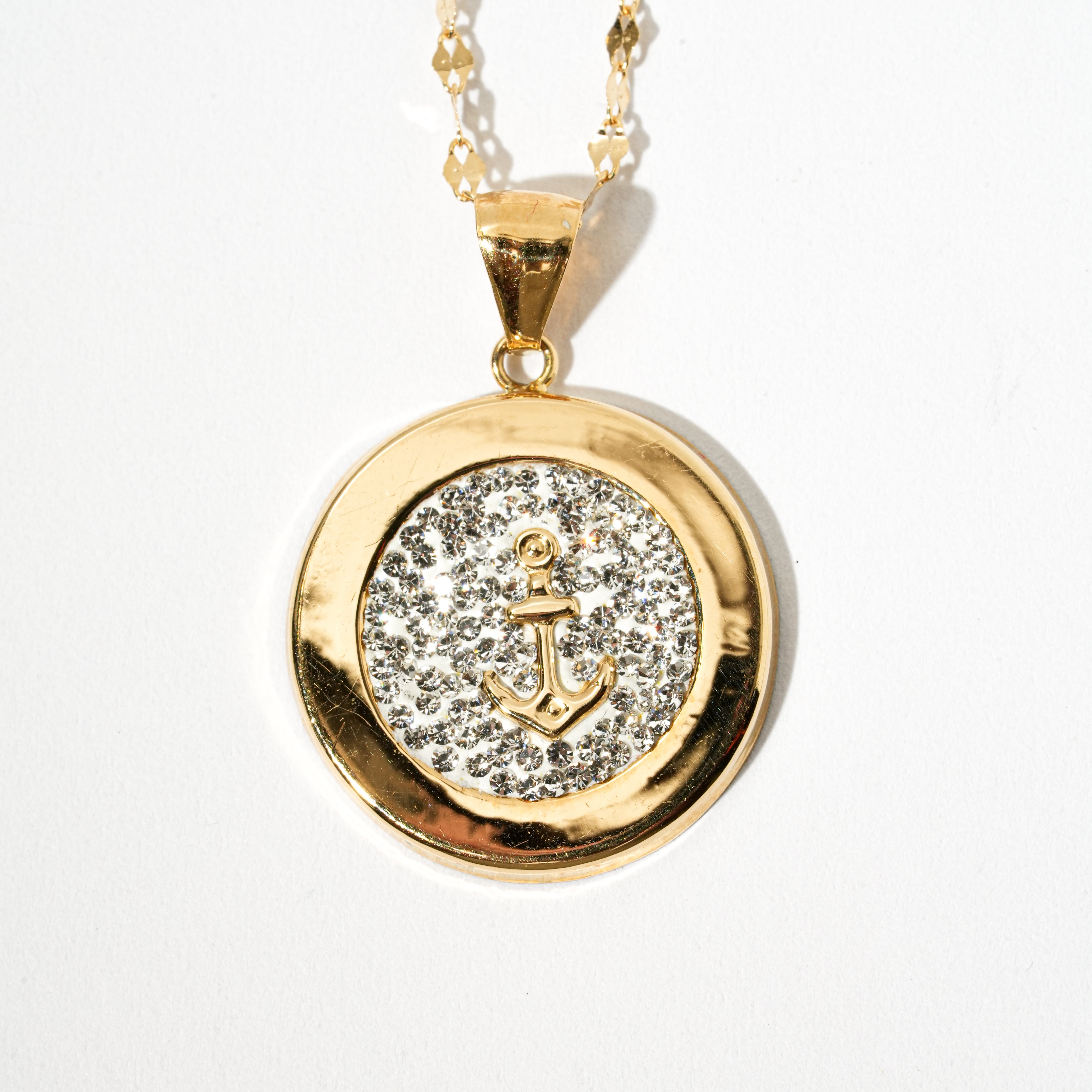 Collana ancora con zirconi in oro 18kt