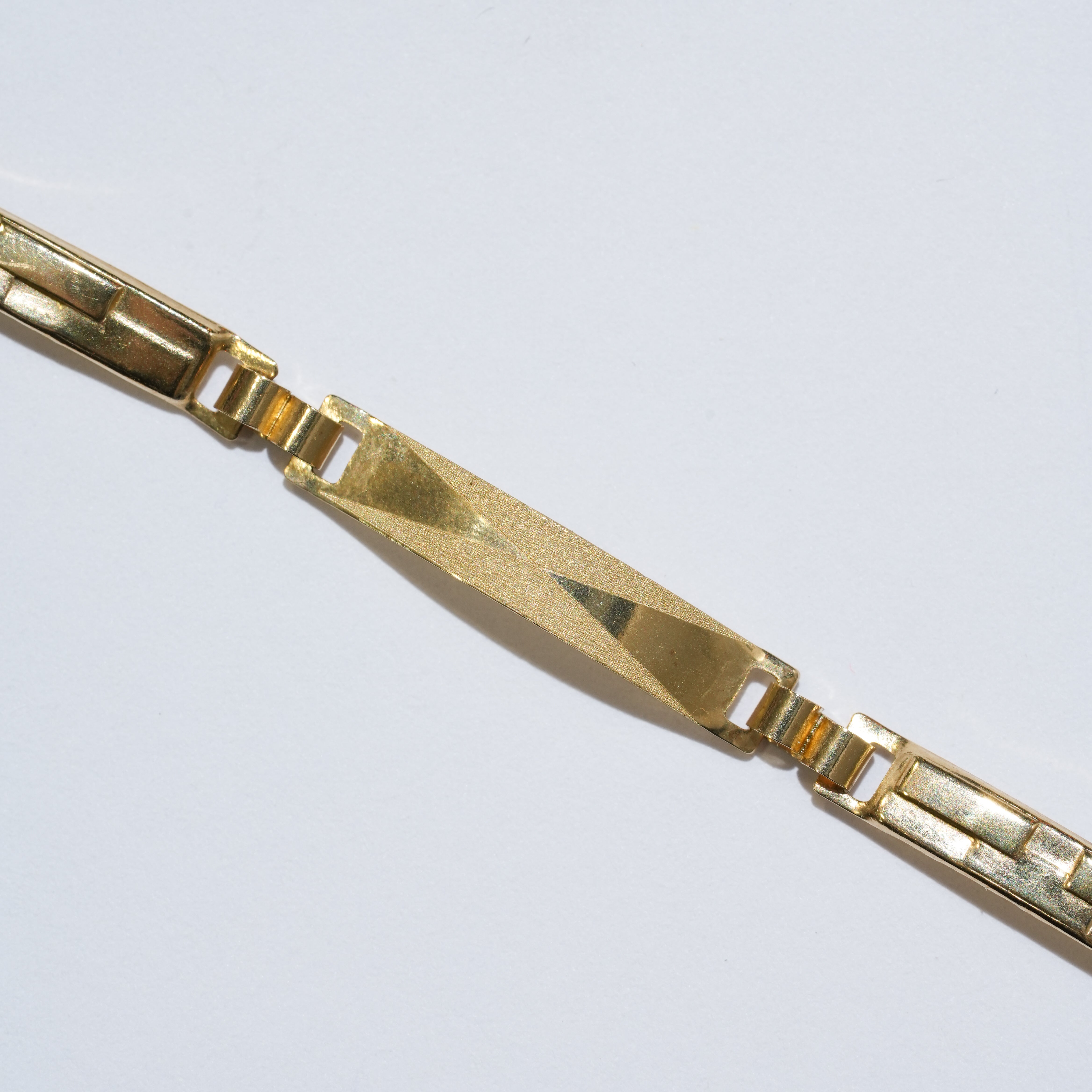 Bracciale a piastra in oro 18Kt