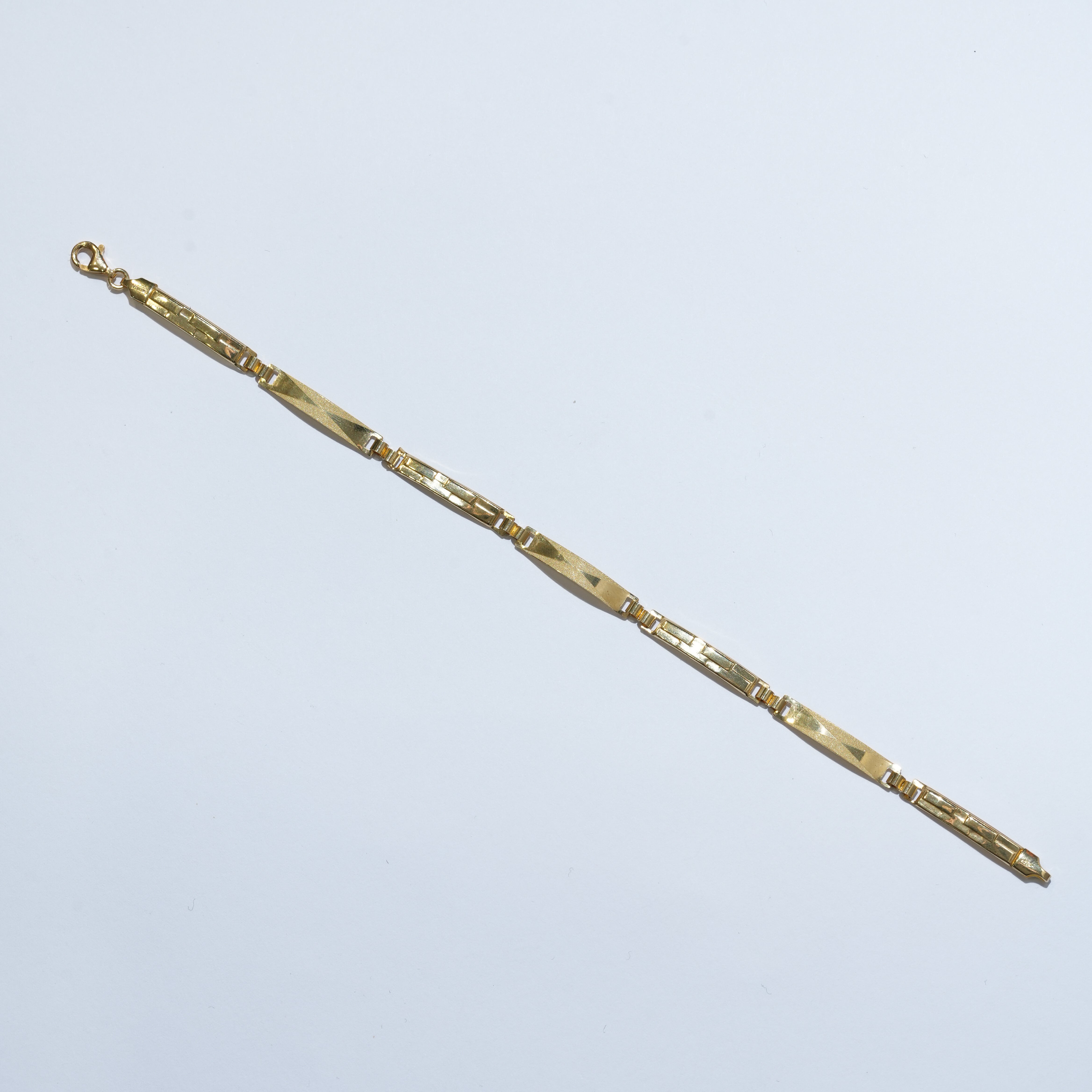 Bracciale a piastra in oro 18Kt