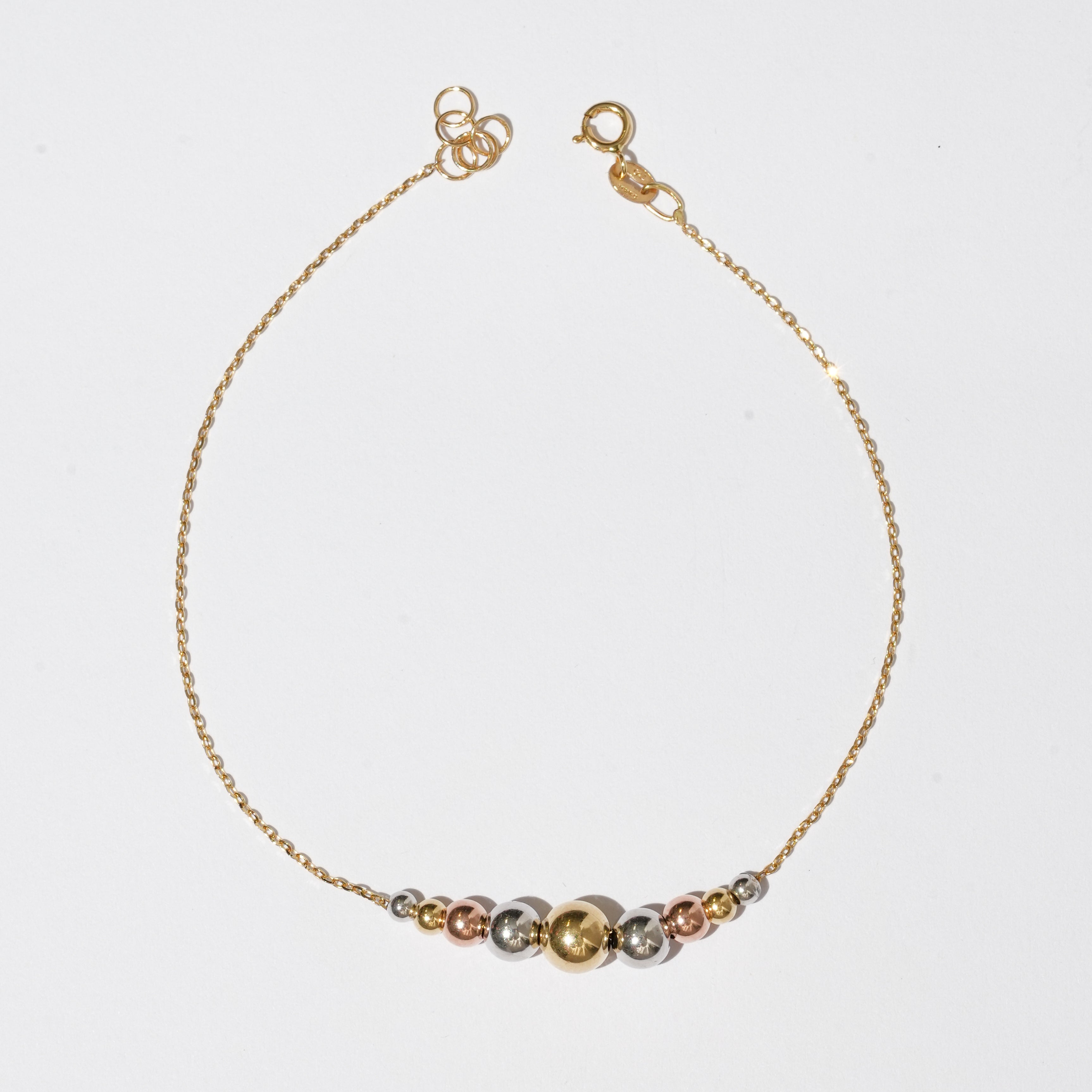 Bracciale a palline bicolore in oro 18Kt